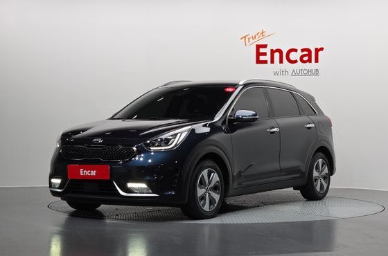 Kia Niro Prestige — пробег 138 236 км — фото 1 из 5