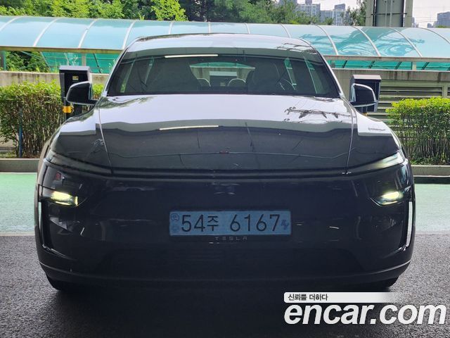 Tesla Model Y L Long Range AWD — пробег 883 км — фото 1 из 5