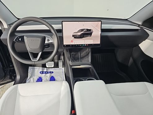 Tesla Model Y RWD — пробег 25 389 км — фото 5 из 5