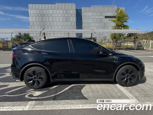Tesla Model Y RWD — пробег 19 578 км — фото 5 из 5