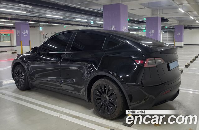Tesla Model Y RWD — пробег 38 000 км — фото 2 из 5