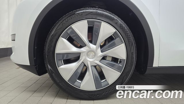 Tesla Model Y RWD — пробег 37 105 км — фото 5 из 5