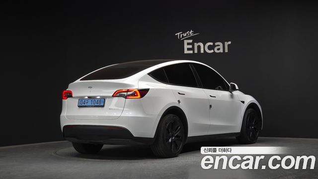 Tesla Model Y Long Range AWD — пробег 32 851 км — фото 2 из 5