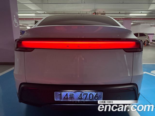 Tesla Model Y Premium RWD — пробег 1 210 км — фото 5 из 5