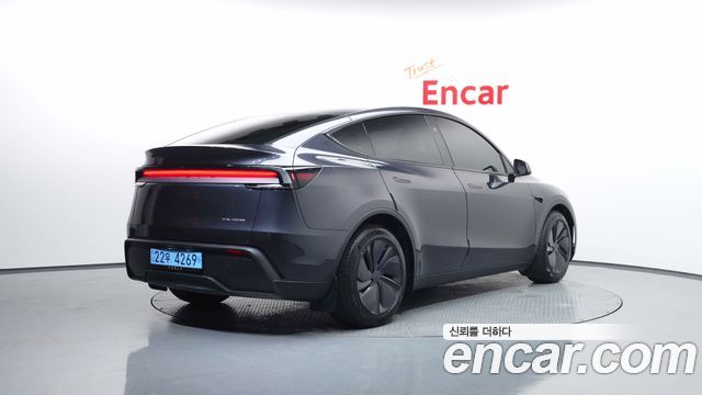 Tesla Model Y Long Range AWD — пробег 26 579 км — фото 2 из 5