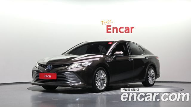 Toyota Camry 2.5 XLE Hybrid — пробег 167 143 км — фото 1 из 5