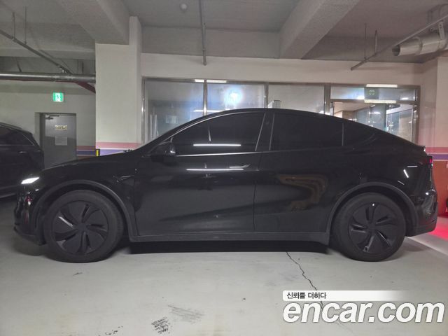 Tesla Model Y Premium RWD — пробег 2 277 км — фото 4 из 5