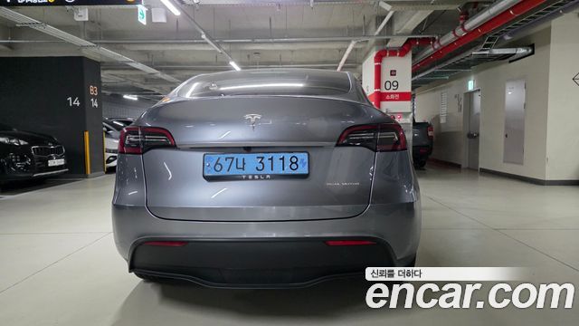 Tesla Model Y Long Range AWD — пробег 56 400 км — фото 4 из 5