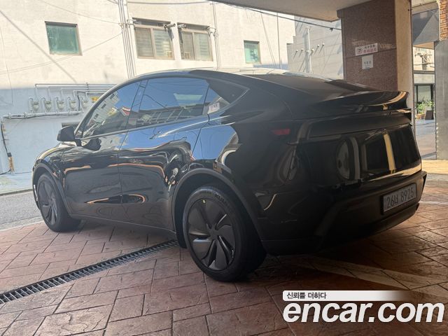 Tesla Model Y Premium RWD — пробег 1 002 км — фото 5 из 5