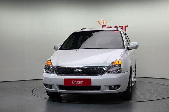 Kia Carnival Grand Carnival GLX Premium — пробег 136 082 км — фото 3 из 5