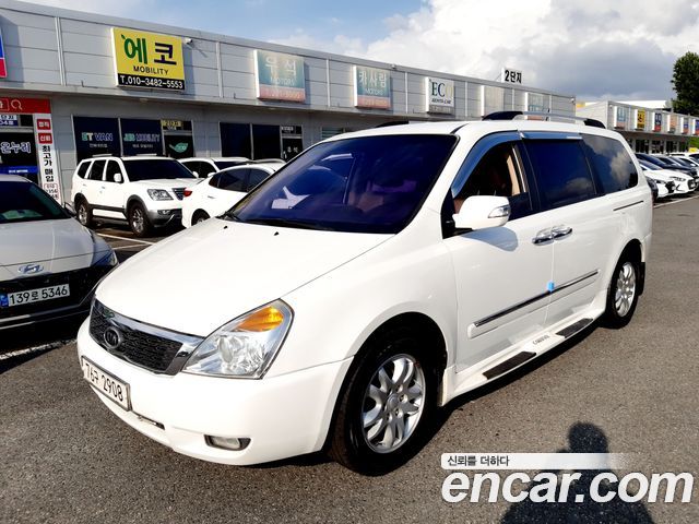 Kia Carnival Grand Carnival GLX Premium — пробег 150 000 км — фото 1 из 5