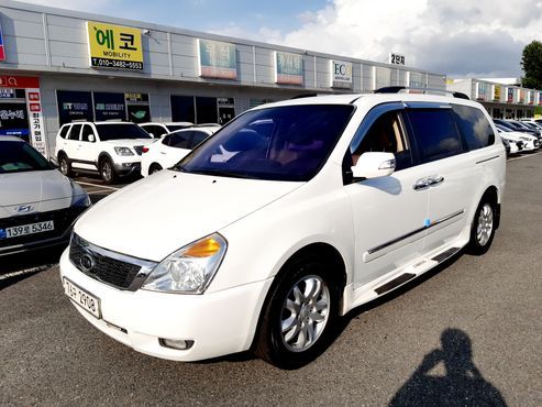 Kia Carnival Grand Carnival GLX Premium — пробег 150 000 км — фото 1 из 5