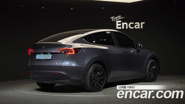 Tesla Model Y Long Range AWD — пробег 82 699 км — фото 2 из 5