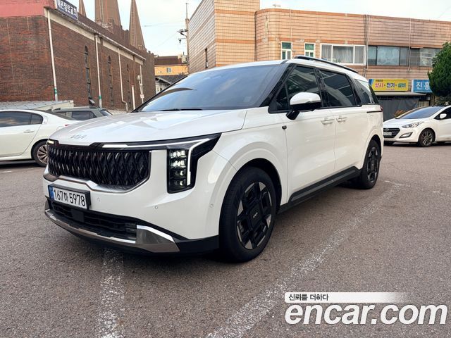 Kia Carnival HEV 9seater Signature — пробег 3 700 км — фото 2 из 5