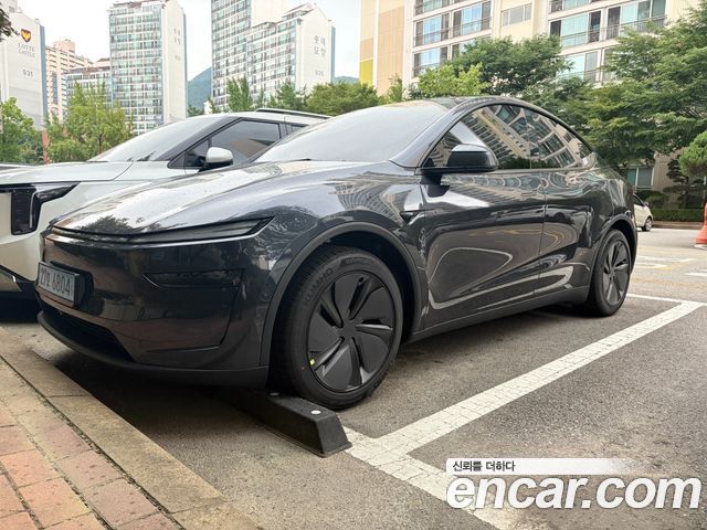 Tesla Model Y Premium RWD — пробег 1 988 км — фото 2 из 5