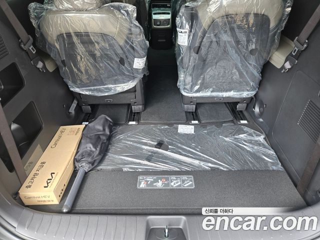 Kia Carnival Hev 9 Seater X Line — пробег 1 500 км — фото 5 из 5