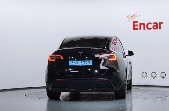 Tesla Model Y RWD — пробег 63 692 км — фото 4 из 5