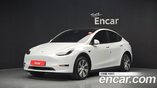 Tesla Model Y Standard Range RWD — пробег 72 047 км — фото 1 из 5