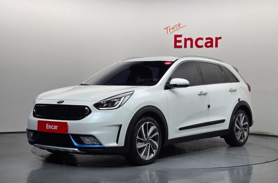 Kia Niro Prestige — пробег 144 974 км — фото 1 из 5