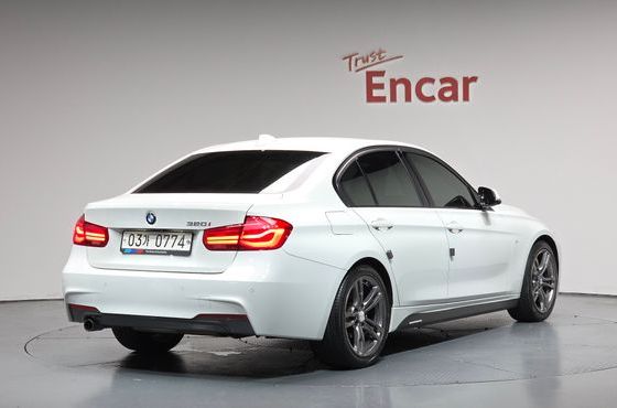BMW 3-Series 320i M Sport — пробег 143 734 км — фото 2 из 5