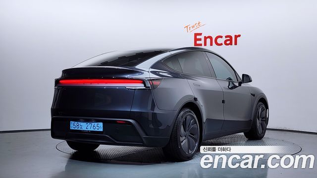 Tesla Model Y RWD — пробег 33 627 км — фото 2 из 5