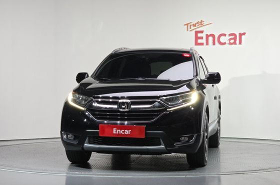 Honda CR-V 1.5 Touring 4WD — пробег 126 711 км — фото 3 из 5