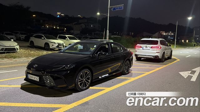 Toyota Camry 2.5 XLE Premium Hybrid — пробег 12 км — фото 1 из 5