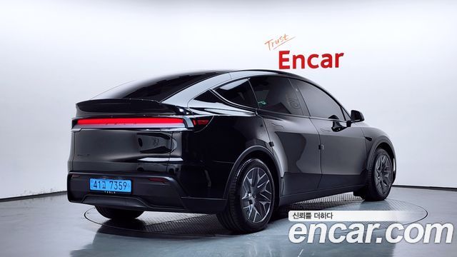 Tesla Model Y L Long Range AWD — пробег 7 599 км — фото 2 из 5