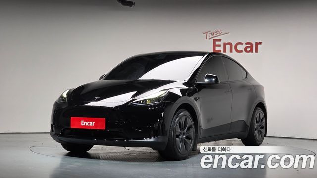 Tesla Model Y RWD — пробег 32 812 км — фото 1 из 5