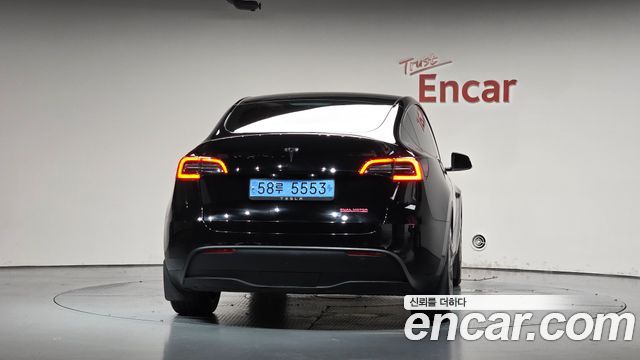 Tesla Model Y RWD — пробег 32 812 км — фото 4 из 5