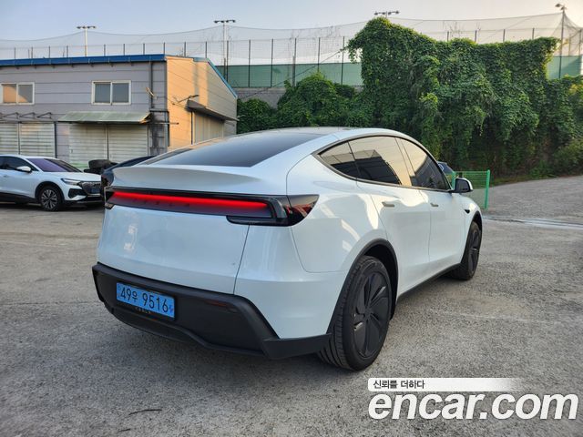 Tesla Model Y Premium RWD — пробег 2 086 км — фото 2 из 5