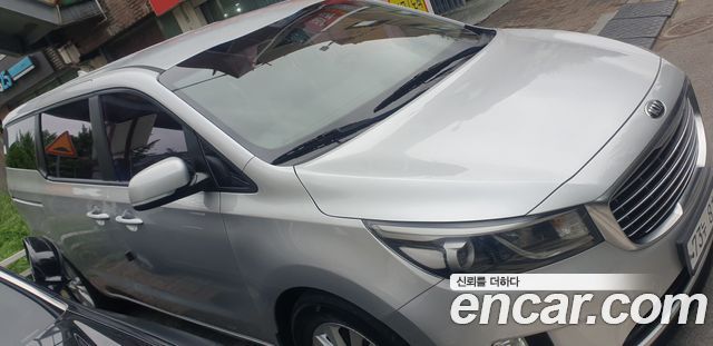 Kia Carnival 11-seater Deluxe — пробег 185 000 км — фото 1 из 5