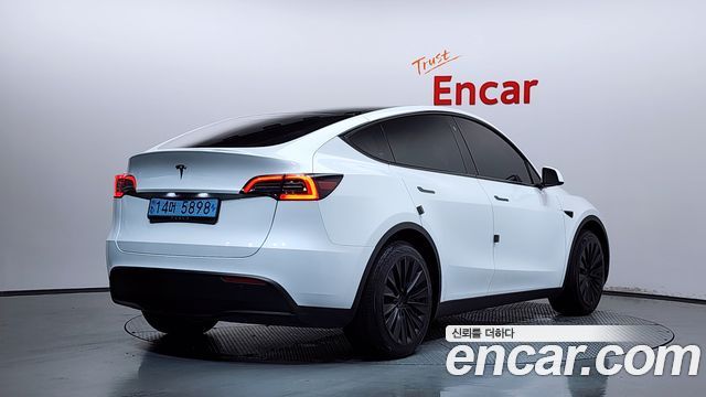 Tesla Model Y RWD — пробег 34 096 км — фото 2 из 5