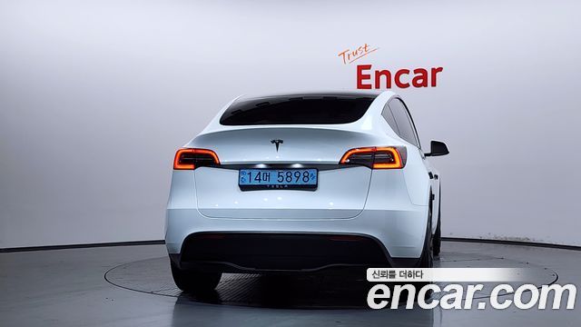 Tesla Model Y RWD — пробег 34 096 км — фото 4 из 5