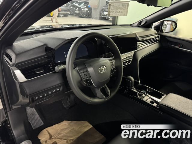Toyota Camry 2.5 XLE Premium Hybrid — пробег 7 км — фото 5 из 5