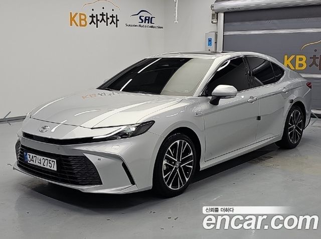 Toyota Camry 2.5 XLE Hybrid — пробег 21 801 км — фото 1 из 4