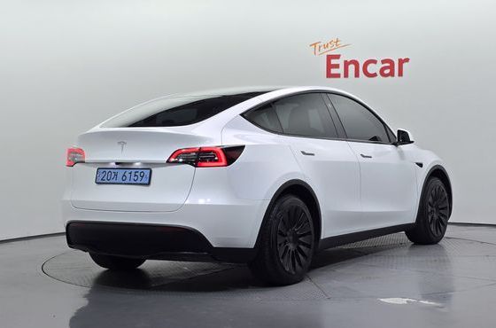 Tesla Model Y RWD — пробег 34 746 км — фото 2 из 5