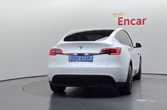 Tesla Model Y RWD — пробег 34 746 км — фото 4 из 5