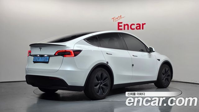 Tesla Model Y RWD — пробег 39 595 км — фото 2 из 5