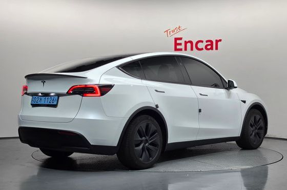 Tesla Model Y RWD — пробег 39 595 км — фото 2 из 5