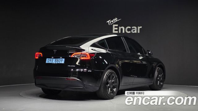 Tesla Model Y RWD — пробег 61 535 км — фото 2 из 5
