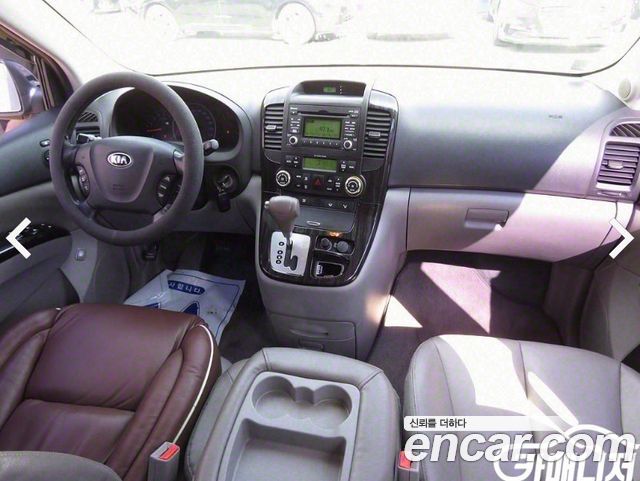 Kia Carnival New Carnival GLX High-Deluxe — пробег 290 220 км — фото 5 из 5