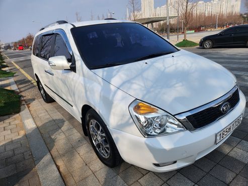 Kia Carnival Grand Carnival GLX Premium — пробег 134 151 км — фото 1 из 5