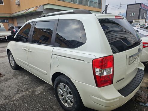 Kia Carnival New Carnival GX Standard — пробег 242 500 км — фото 4 из 5