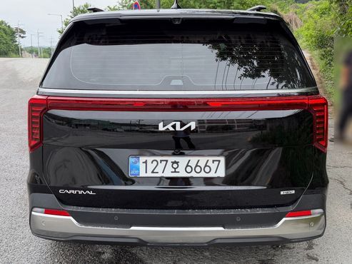 Kia Carnival HEV 9seater Signature — пробег 1 630 км — фото 4 из 5