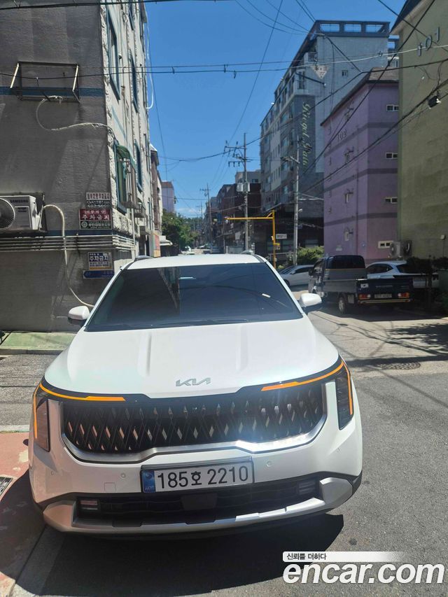 Kia Carnival HEV 9 seater Prestige — пробег 1 400 км — фото 1 из 5