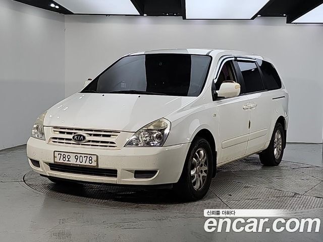 Kia Carnival LPI GX Deluxe — пробег 241 100 км — фото 1 из 5