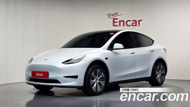 Tesla Model Y RWD — пробег 64 317 км — фото 1 из 5