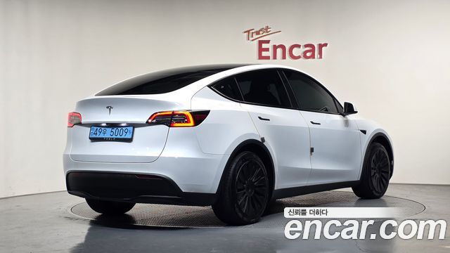 Tesla Model Y RWD — пробег 38 944 км — фото 2 из 5