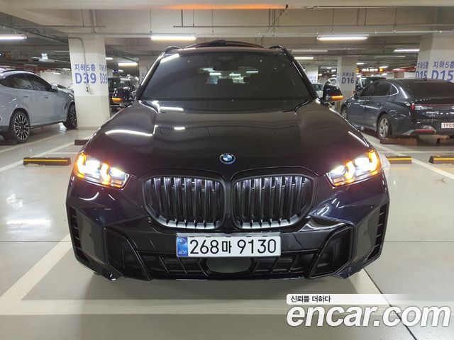 BMW X5 xDrive 50e M Sport — пробег 1 742 км — фото 1 из 5